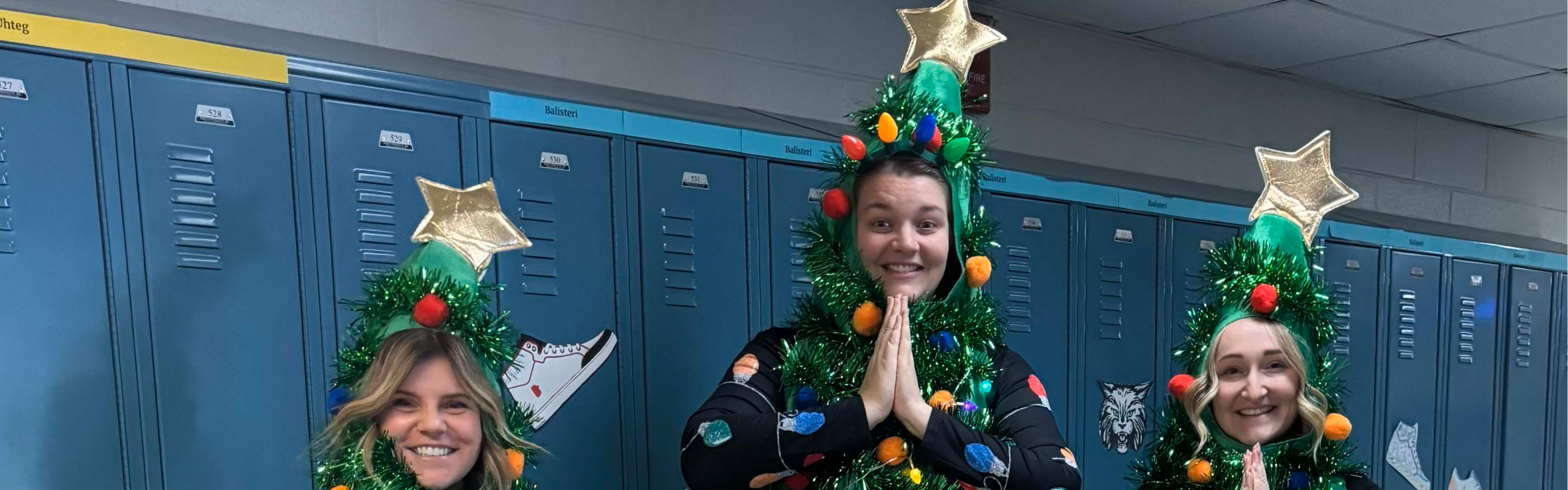 students dressed as christmas trees