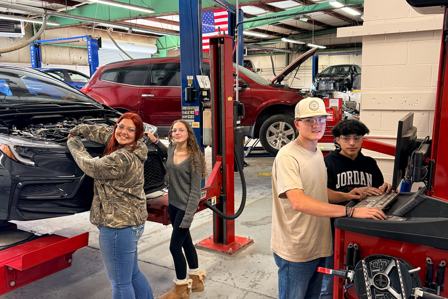 Students working on a car