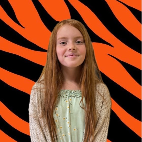 girl in front of tiger background