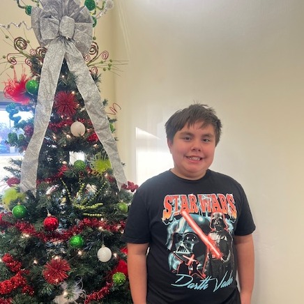 boy with christmas tree background