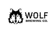 A stylized black and white logo featuring a wolf's face alongside the text 'WOLF BREWING CO.'