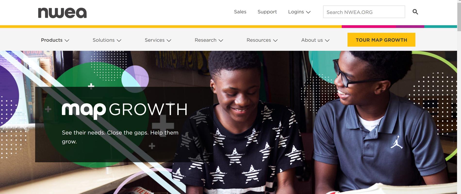 A website banner featuring two young boys engaged in conversation, with the text 'mapGROWTH' prominently displayed against a colorful background.