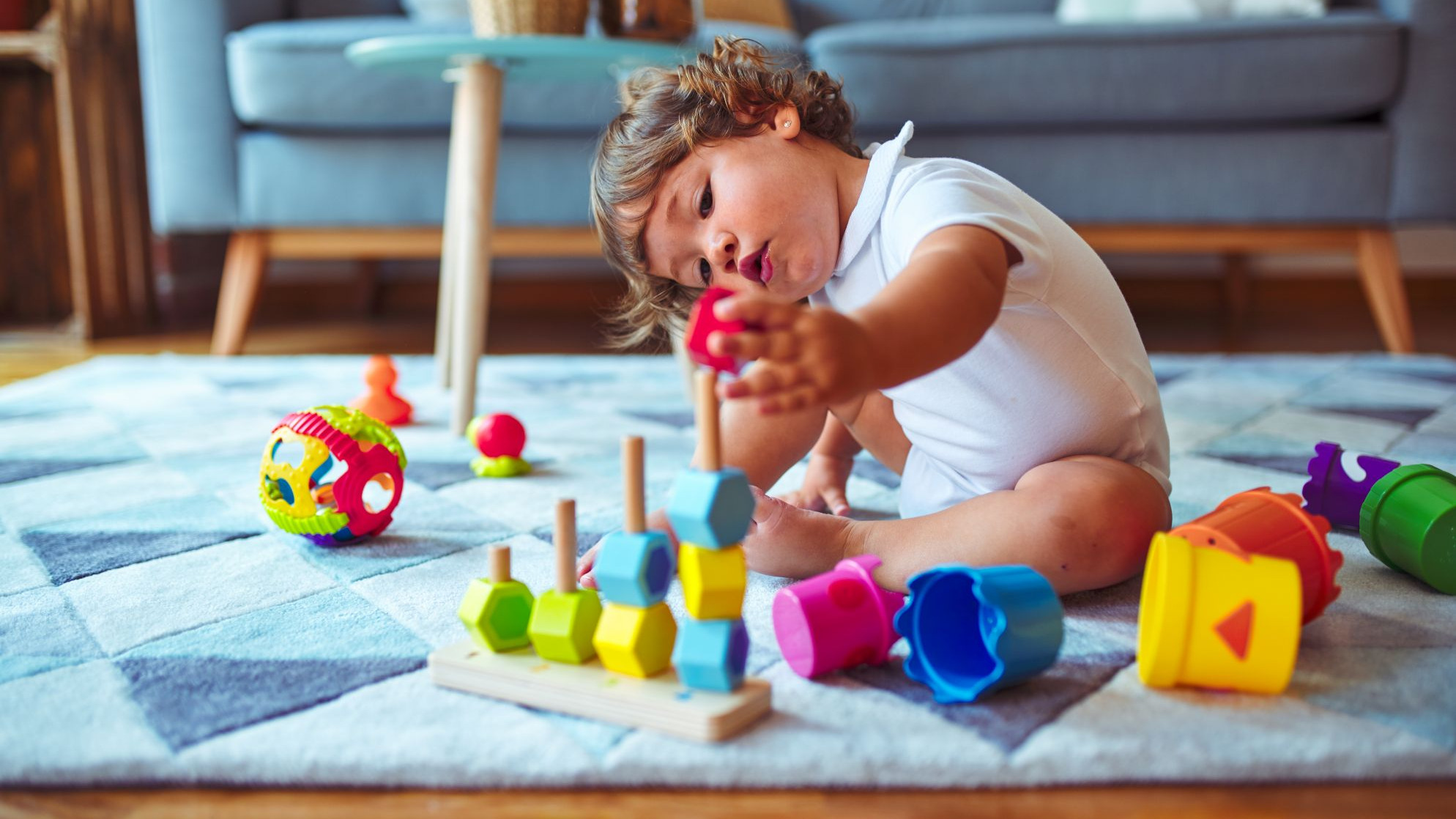 toddler paying on the floor