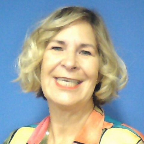 women with short blond hair, blue background