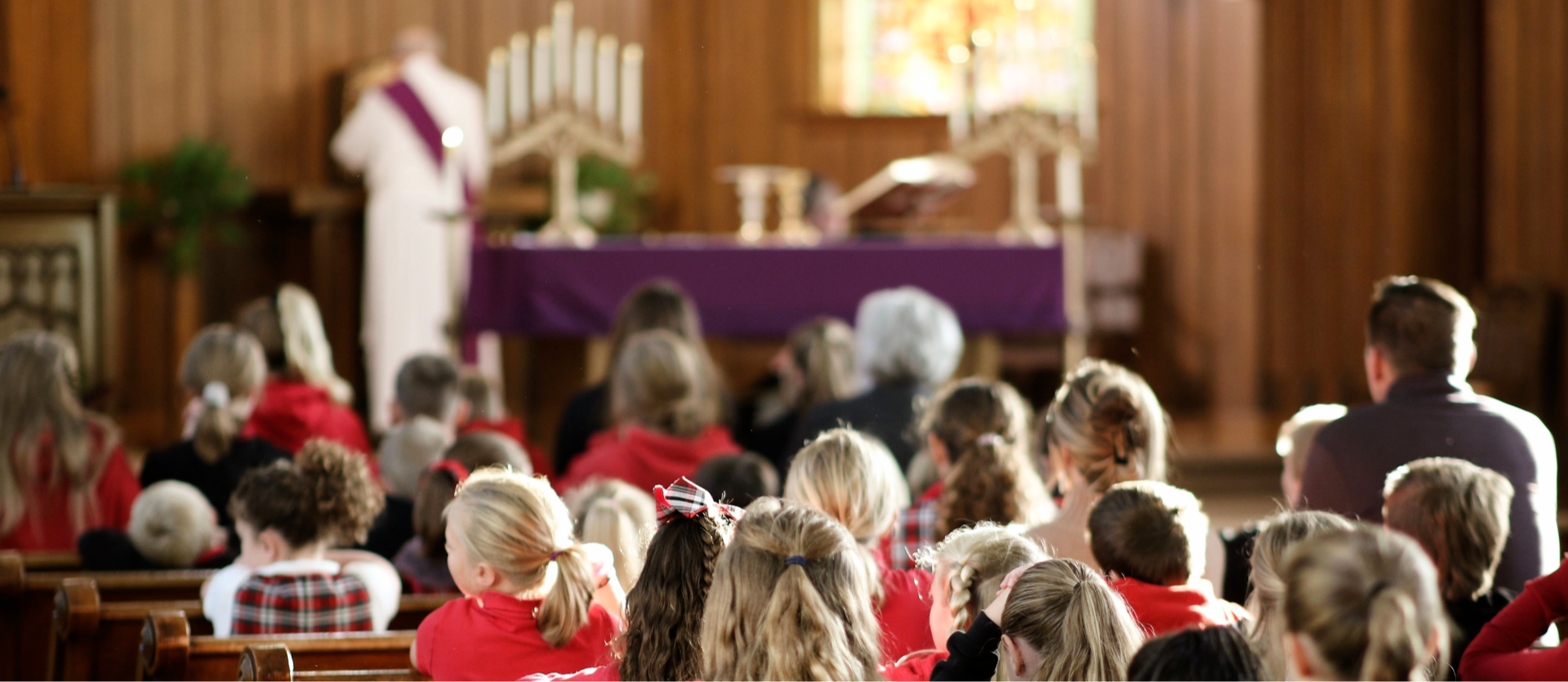 Students praying in church