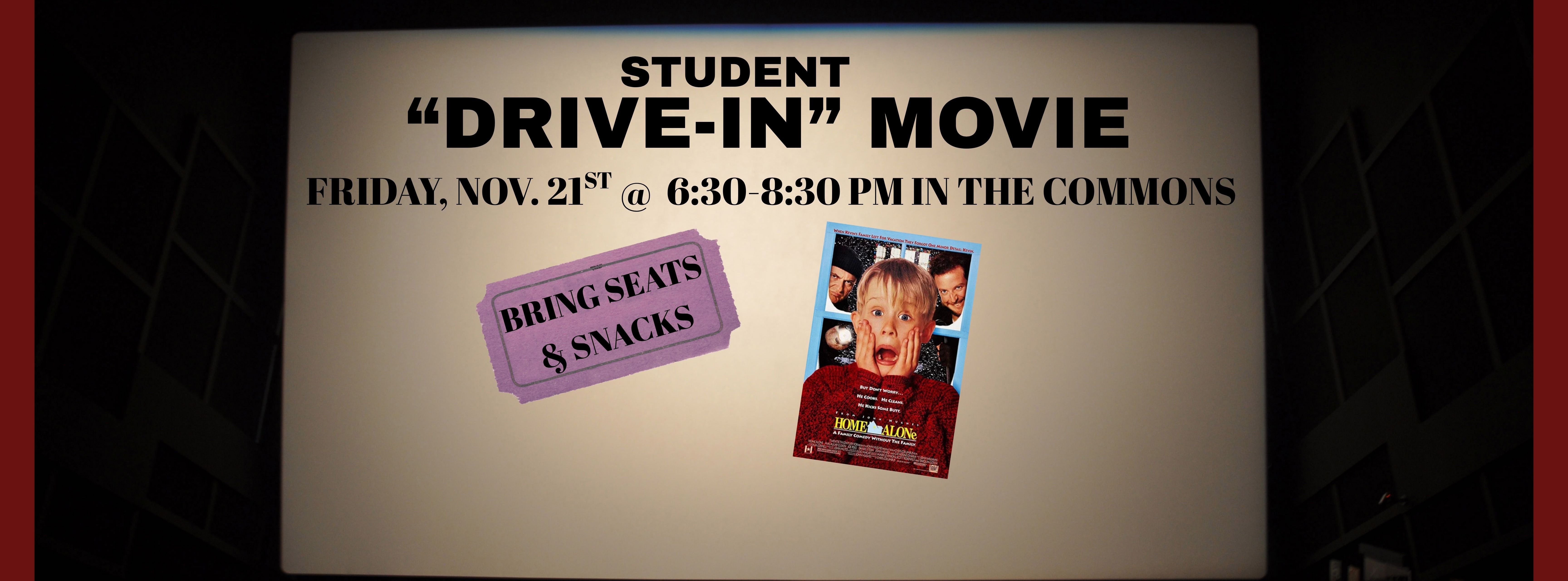 A movie screen announcing a "drive-in" movie