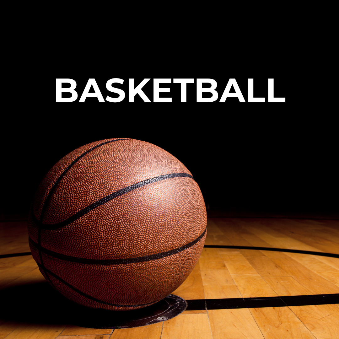 Basketball sitting in the shadows on a court