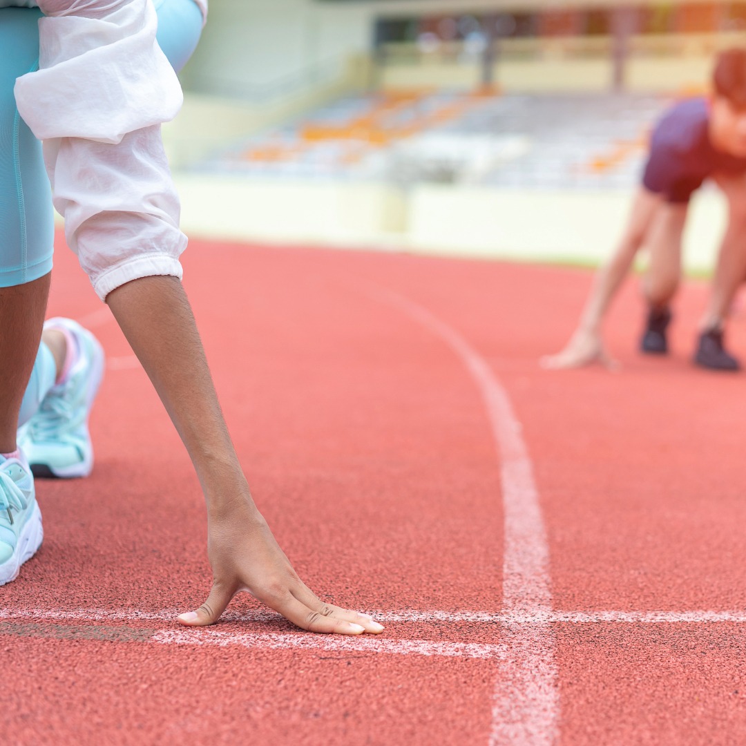 Student athletes at track starting line