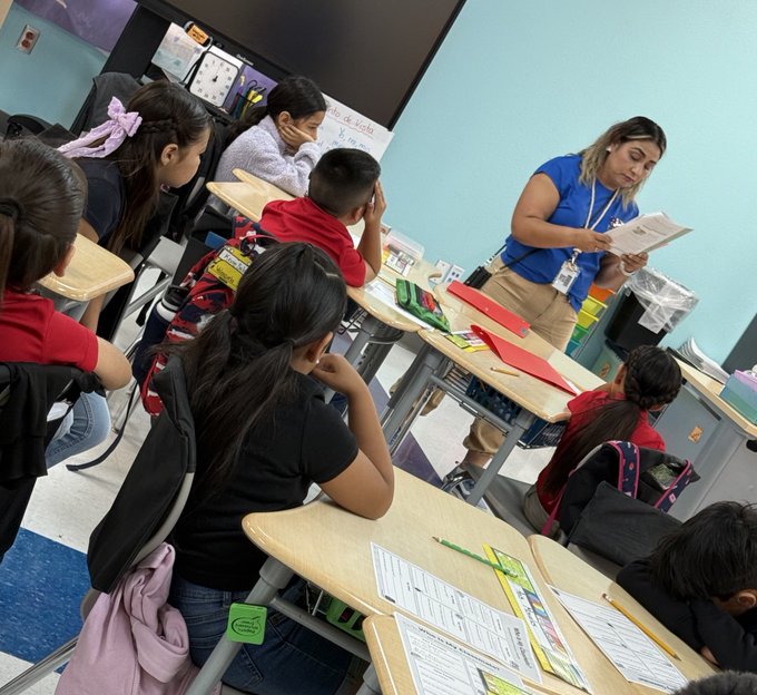 Teacher reading to students