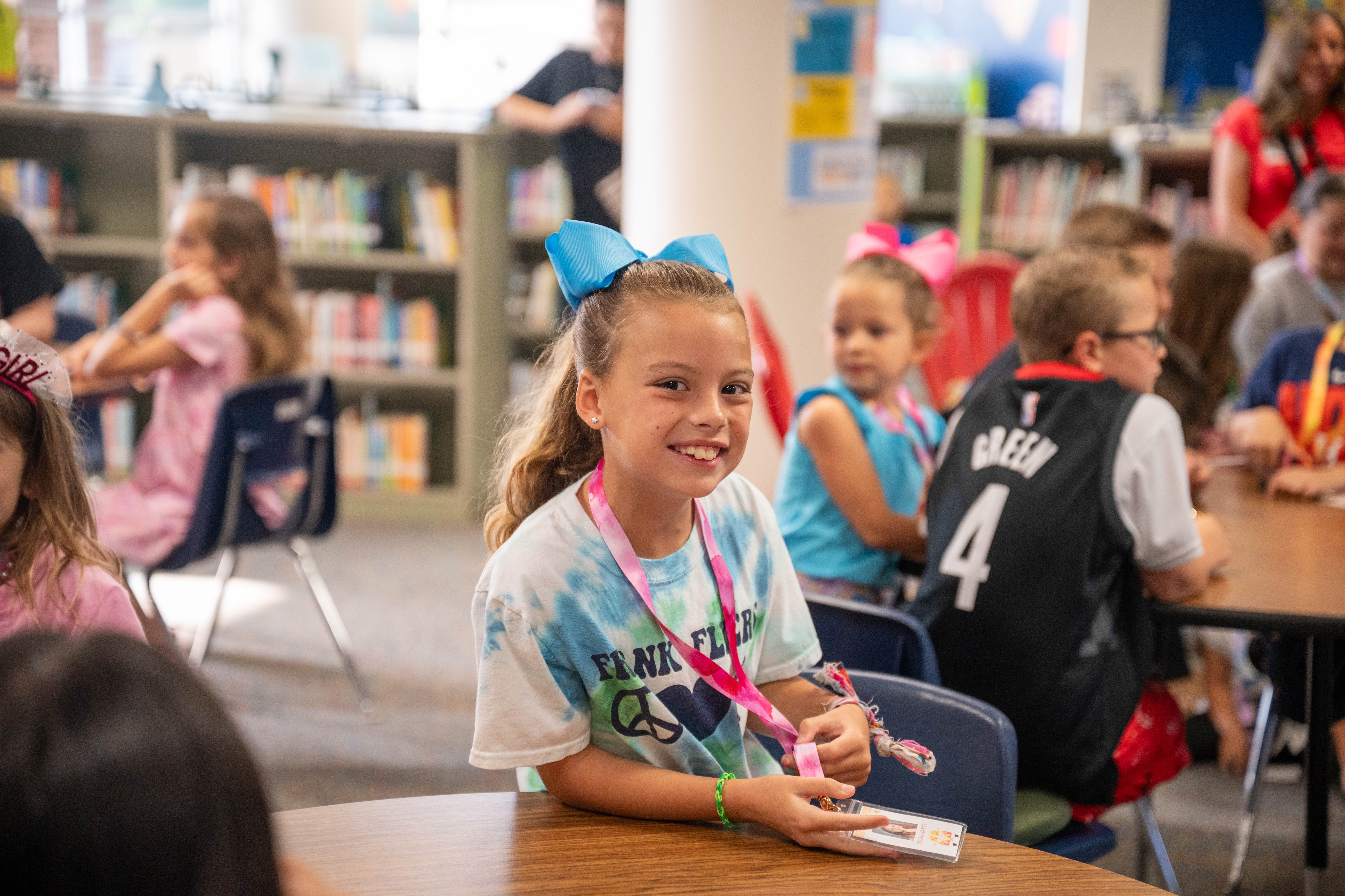 girl smiling in library