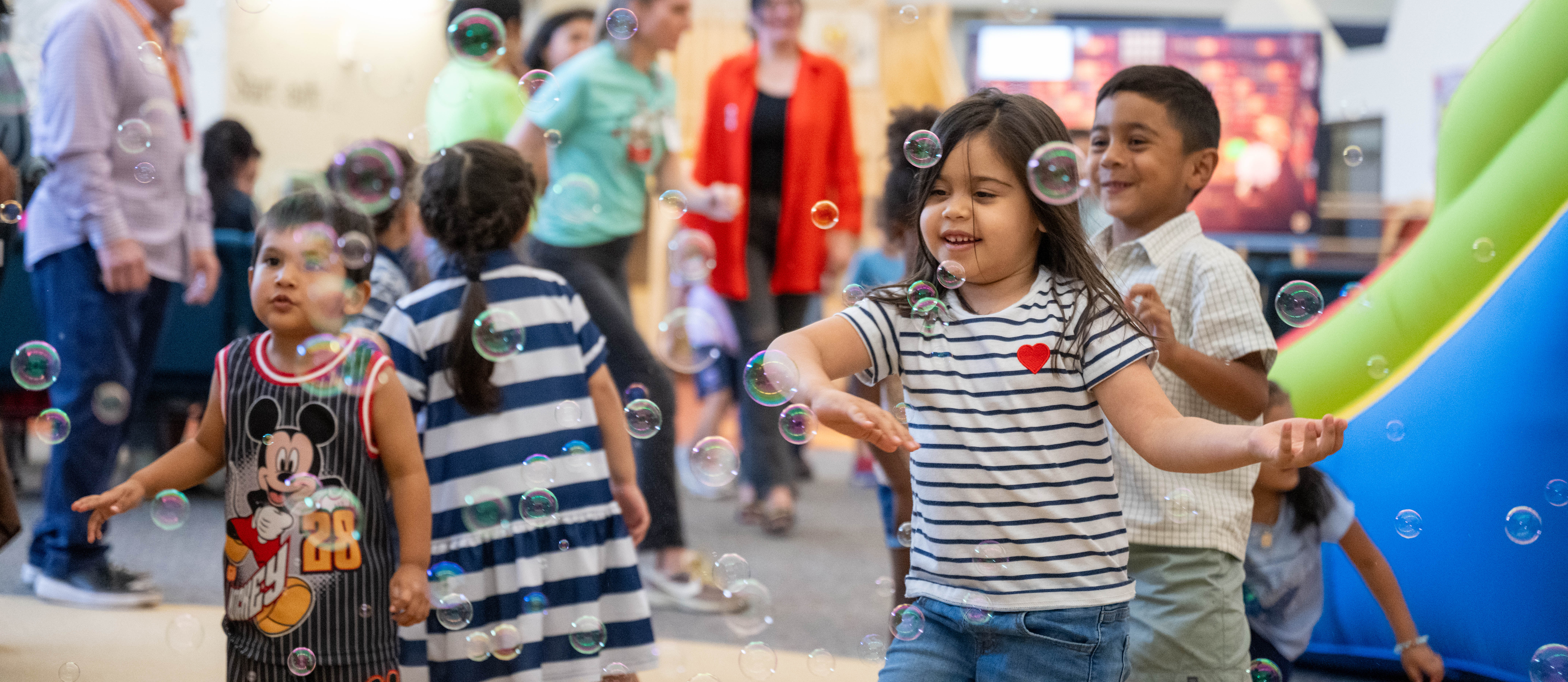Student playing with bubbles as a reward
