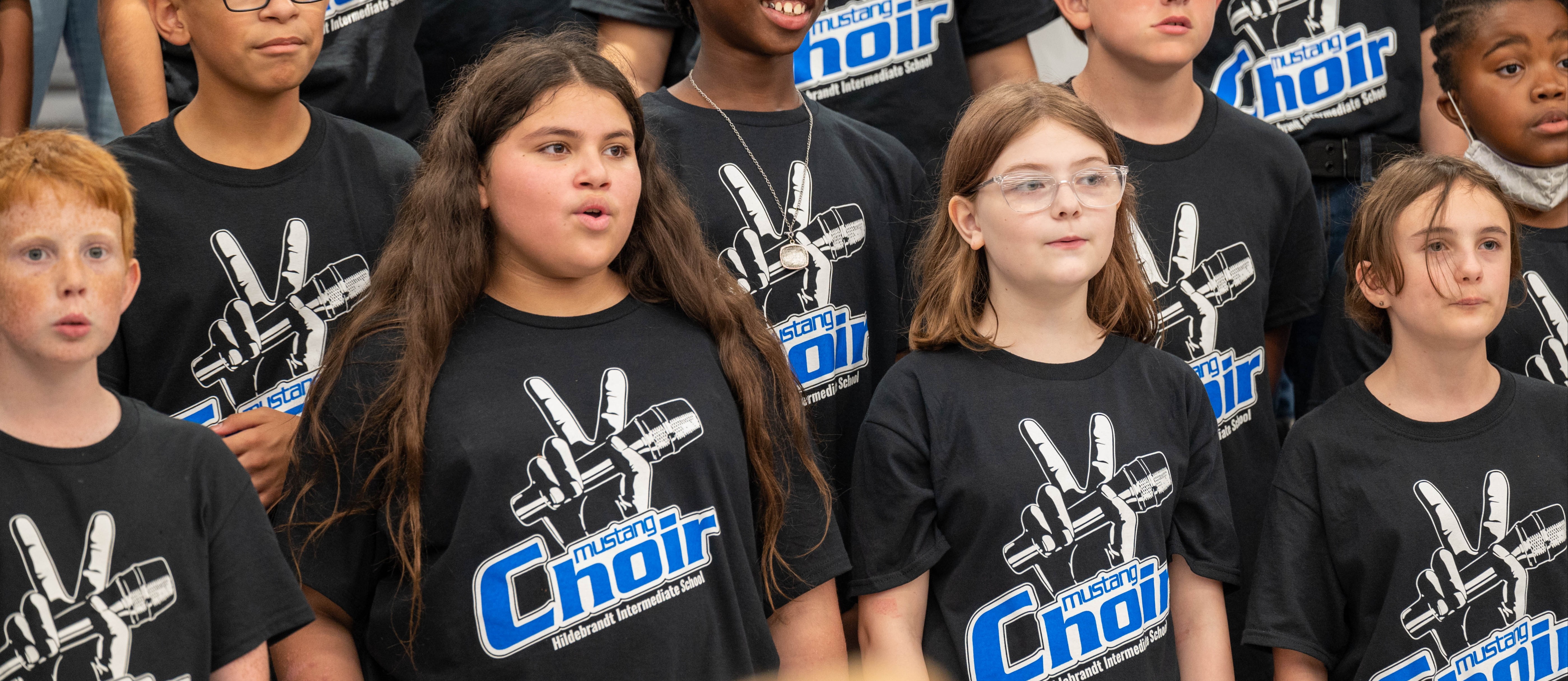 group of choir kids sing