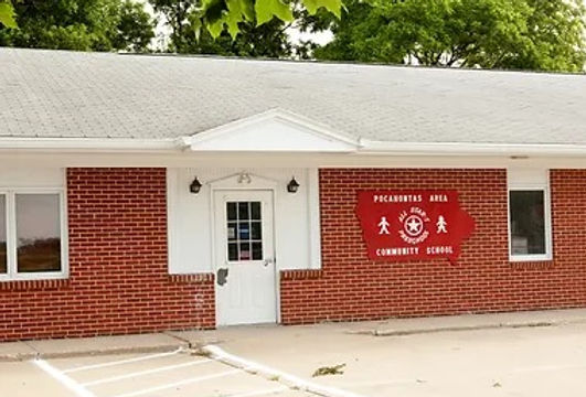 Red brick building featuring a prominent sign that reads "Fire Department."