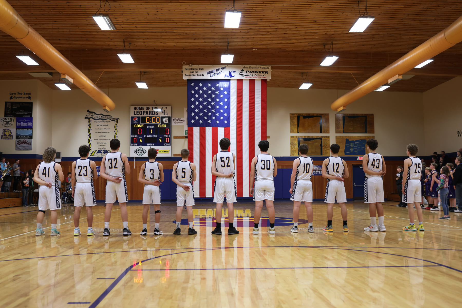 Cove basketball team and the American flag 