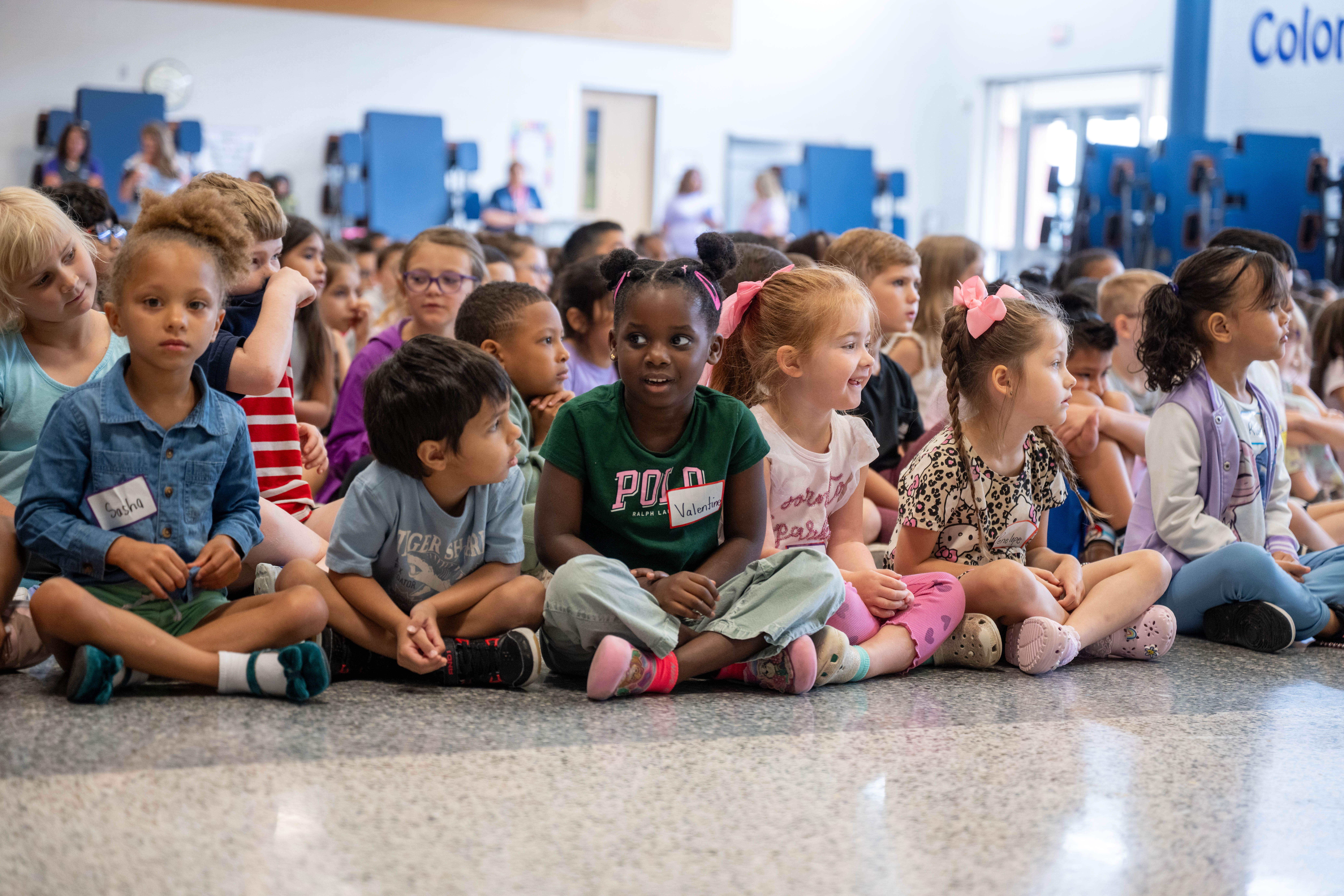 students sitting on the floor