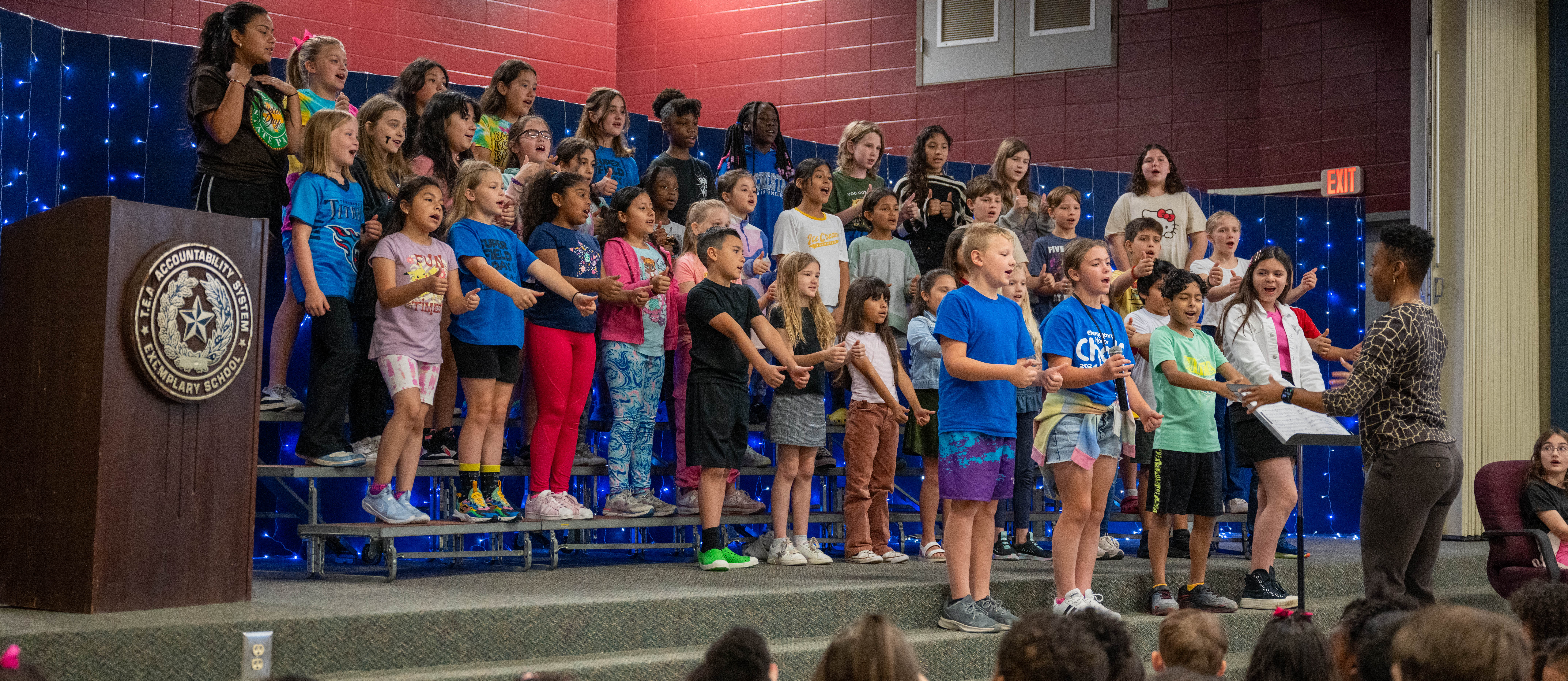 children singing in a program