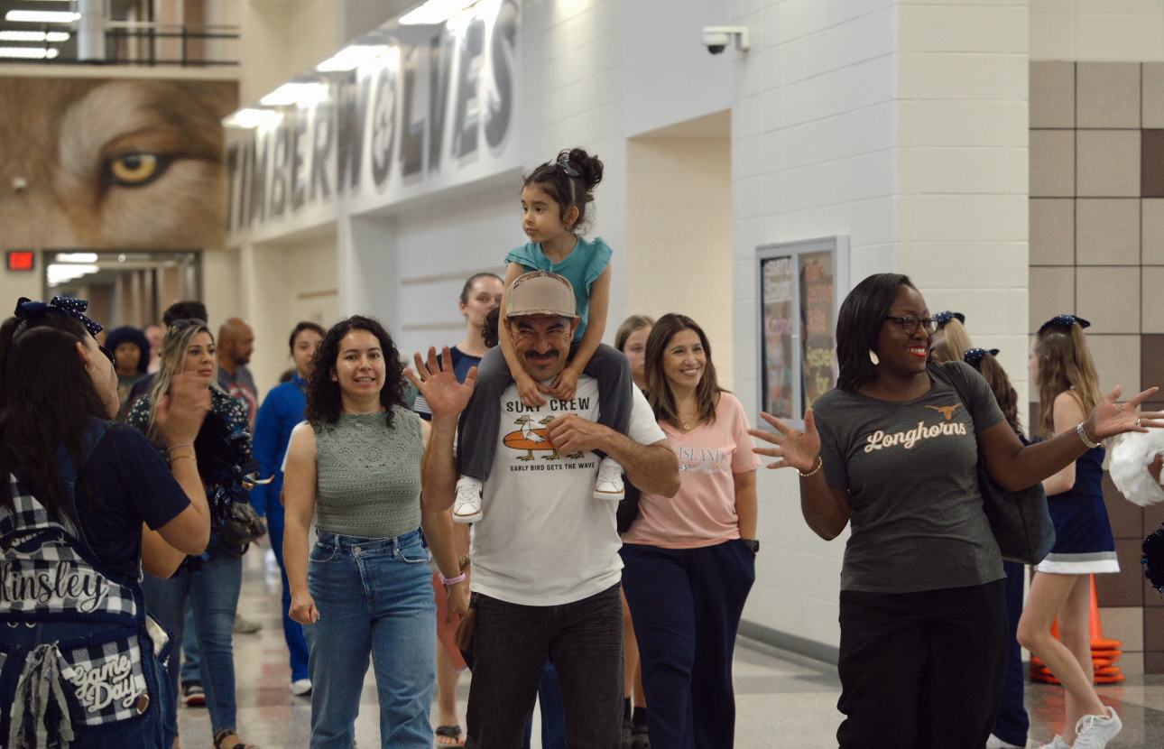 Families walking the hallways at Schindewolf Intermediate