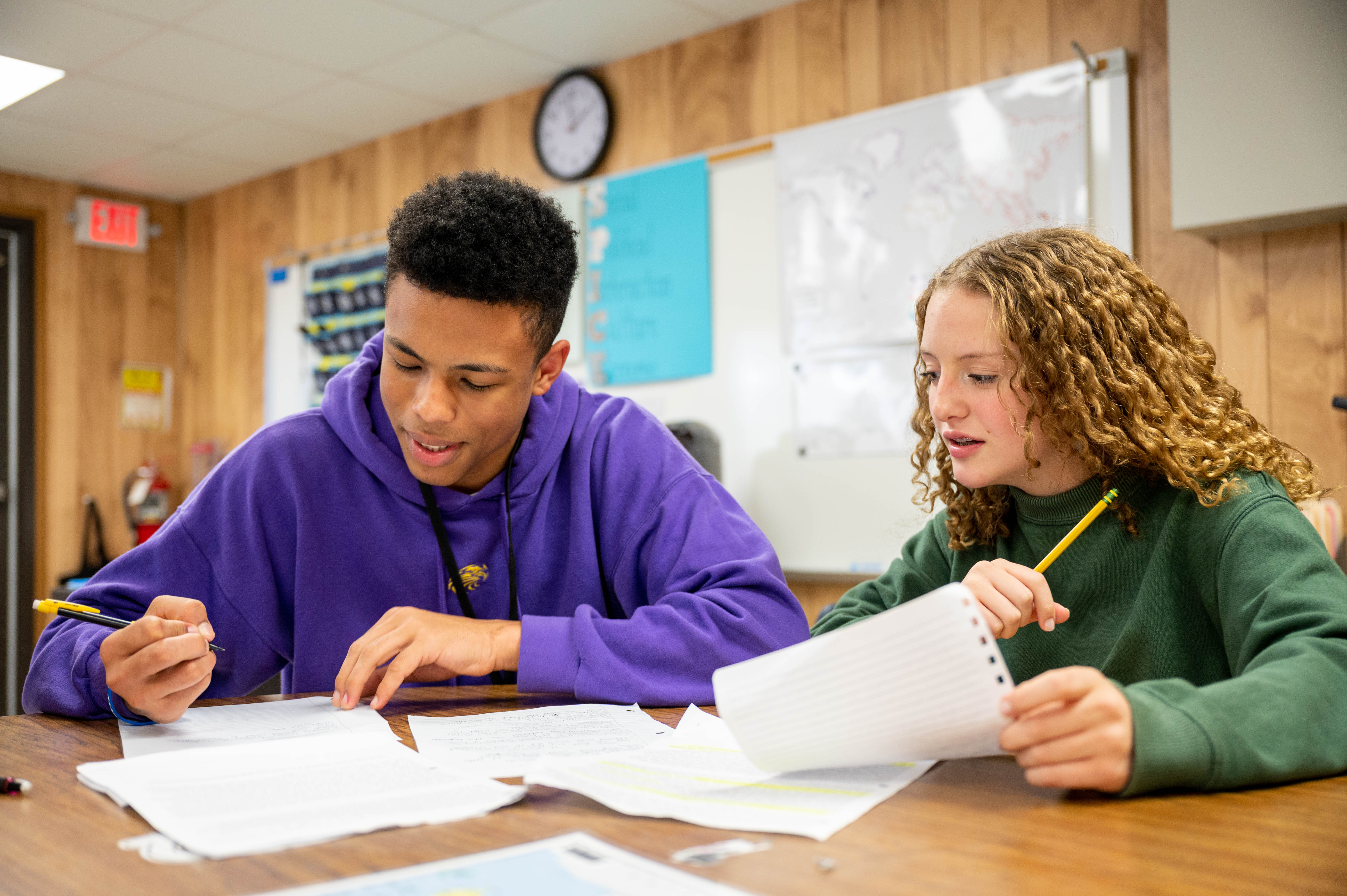 Two students working side by side