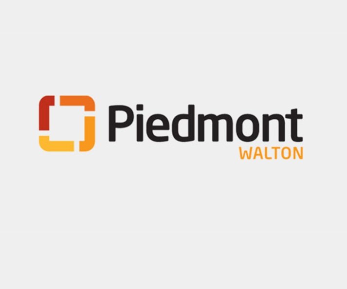 A logo featuring the word 'Piedmont' in bold black letters, with 'Walton' in smaller orange letters below, accompanied by a stylized square graphic in orange and yellow.