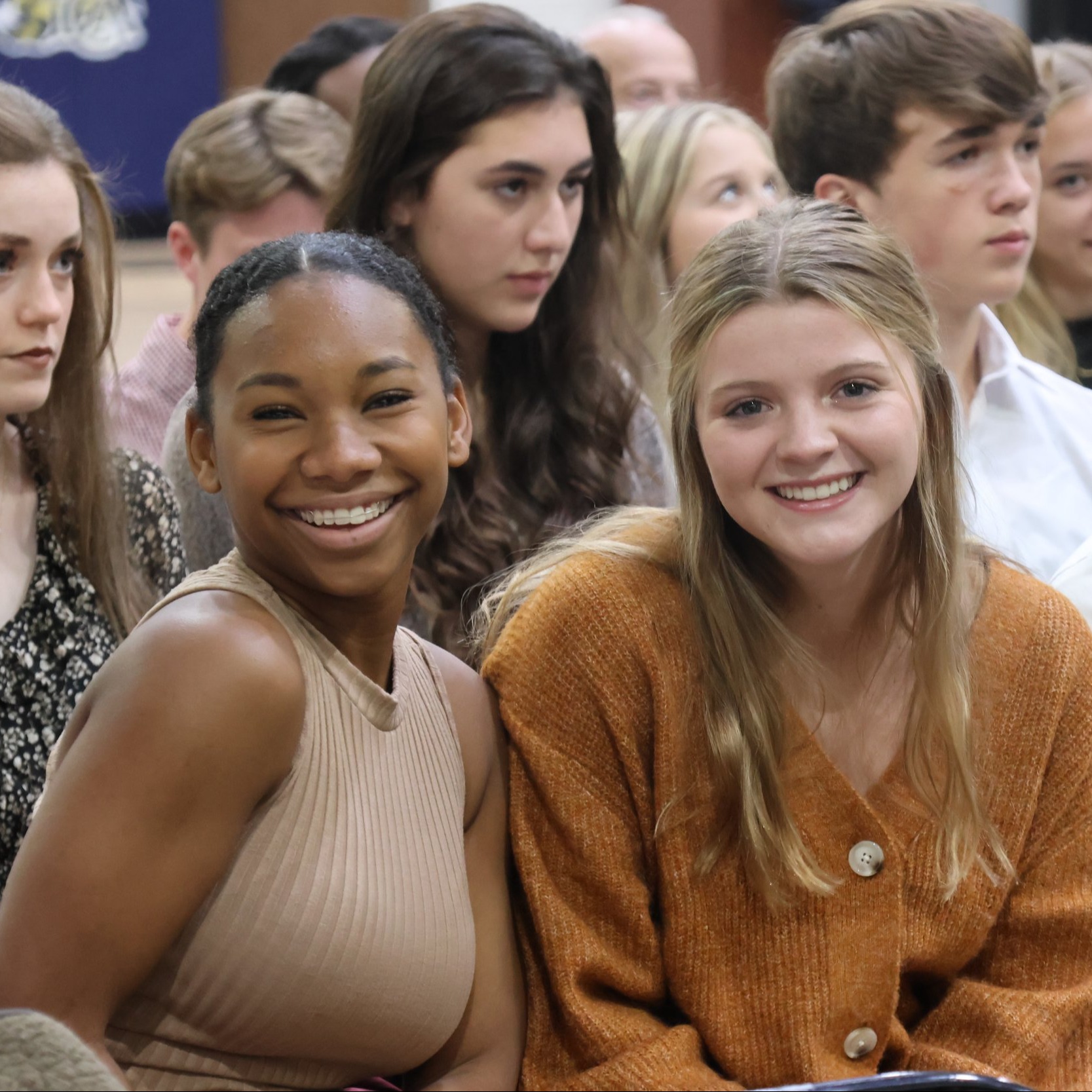 two female students smiling