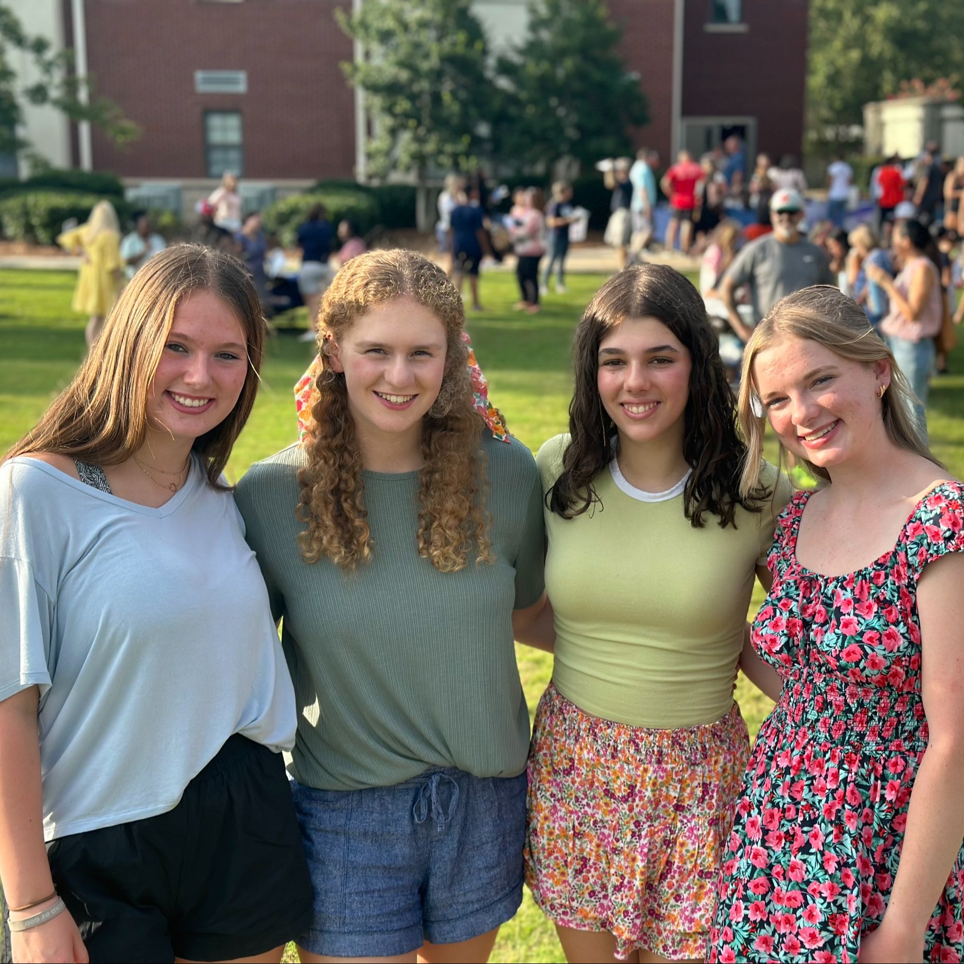 4 girls smiling