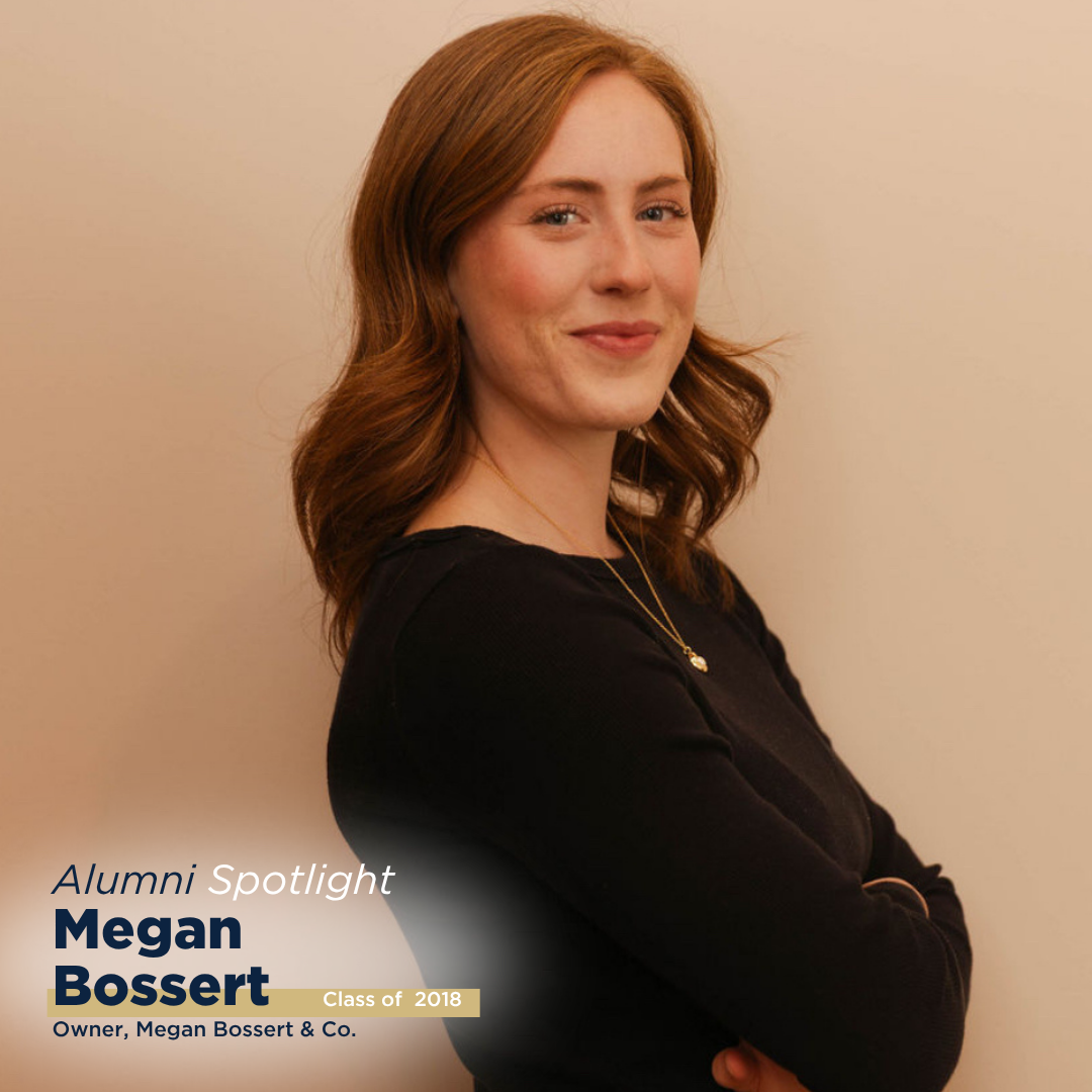 A smiling woman poses for a photo with her arms folded, featuring her in an alumni spotlight blog post.