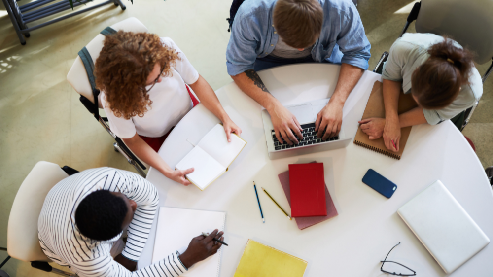 employees around a table