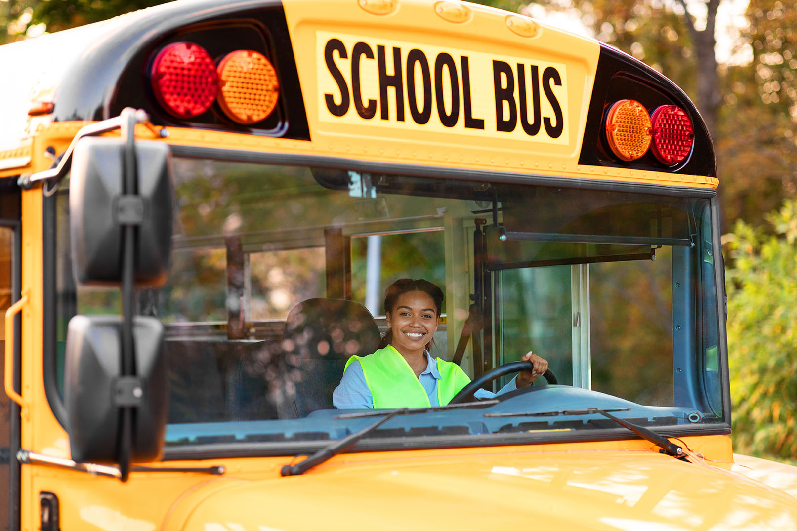 Female driving a school bus