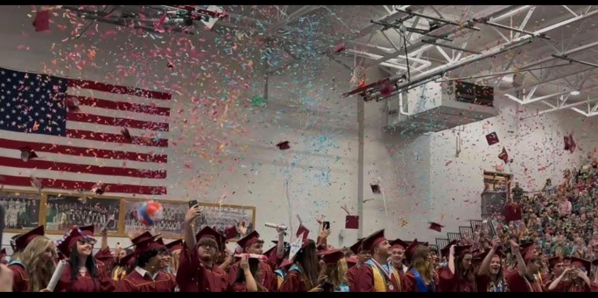 This photo shows confetti flying through the air as the class of 2025 has been declared graduates of Bourbon County High School. 