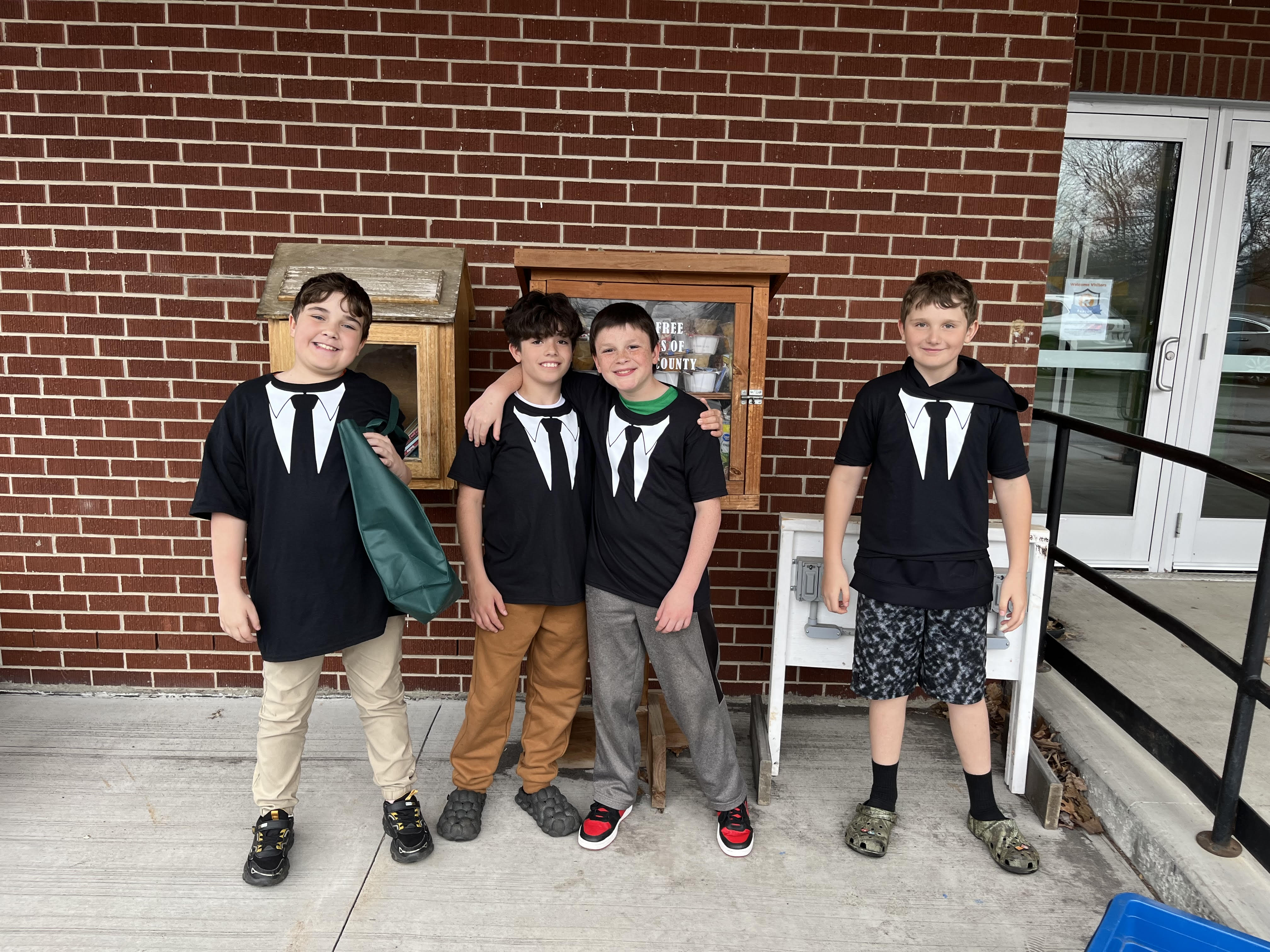 Members of Crellin's Social Club pose together for a picture.