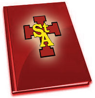 A red book with a yellow 'StA' logo and a cross design on the cover.