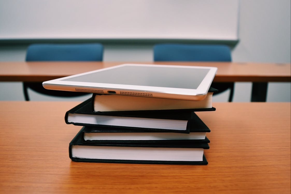 tablet on books