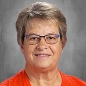 Headshot of Lisa Eisenhower Smiling wearing glasses