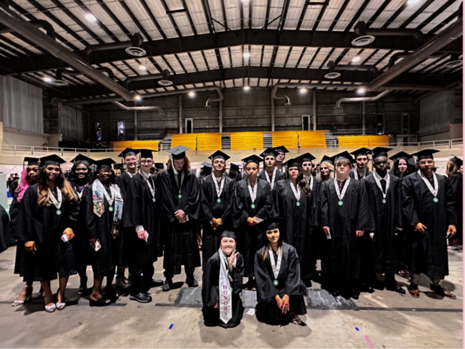 People in cap and Gowns