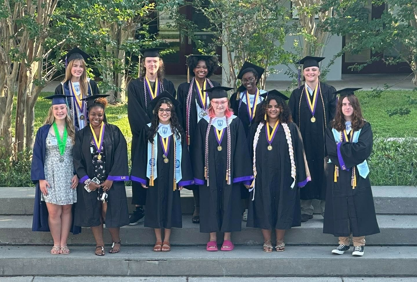 Picture of 11 graduating seniors that attended Cypress Creek Elementary