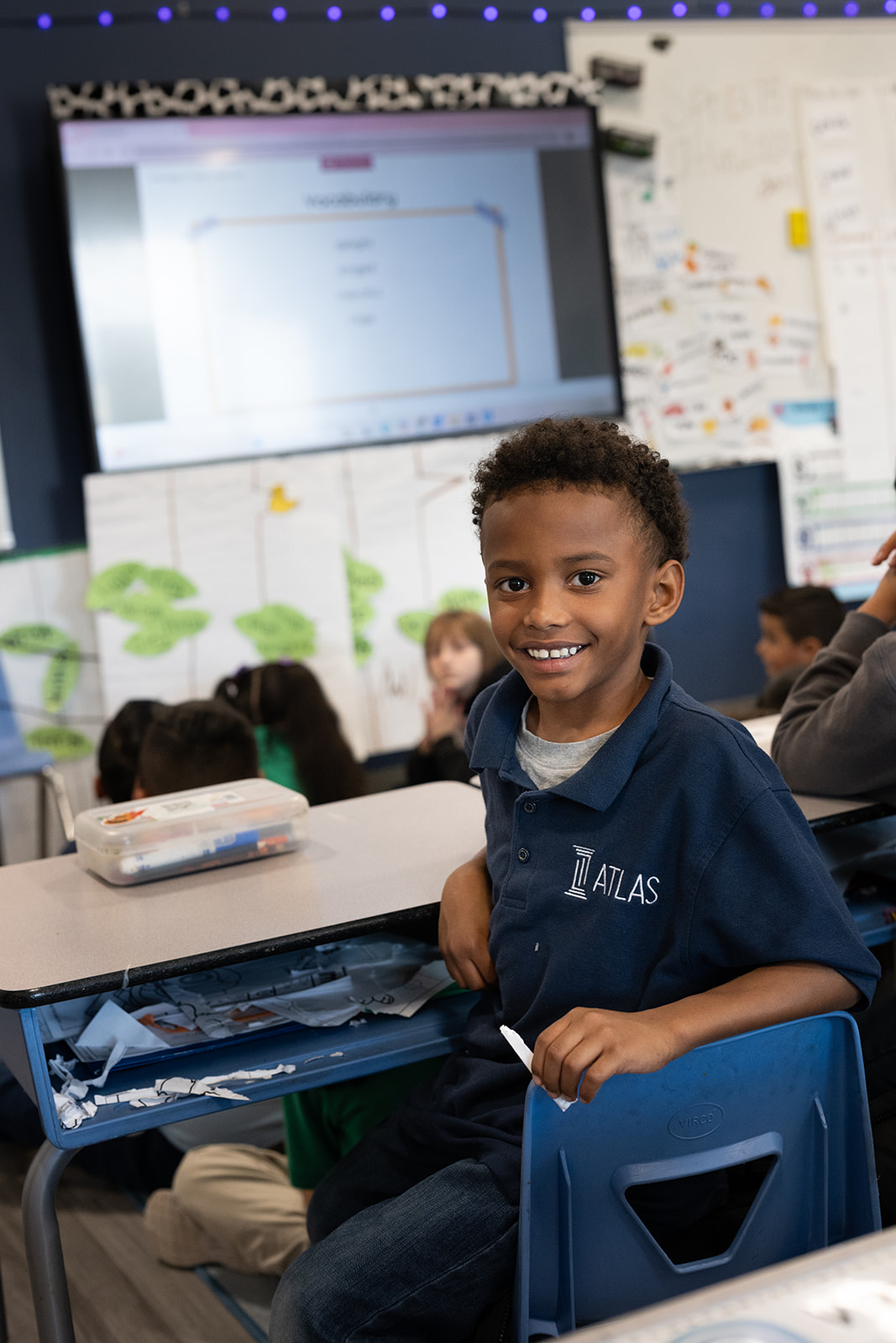 elementary school student smiles