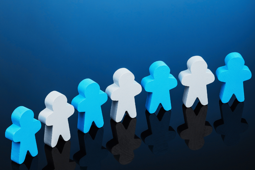 People icon linked together in a semi-cricle  to represent a global community.