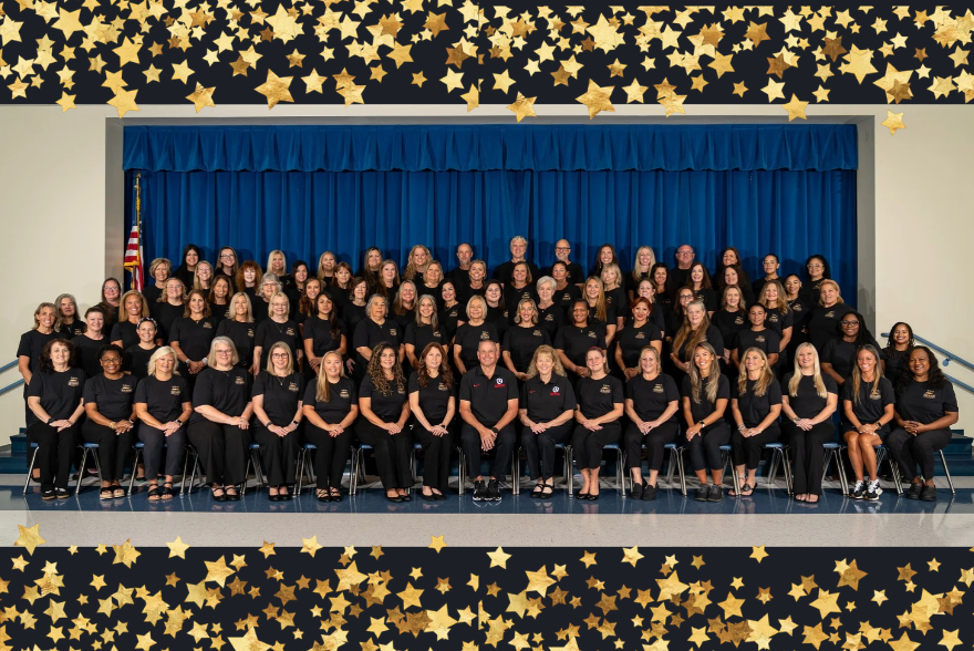 Staff photo of FishHawk Creek Elementary outside the front of the school with gold stars  across the top and bottom.