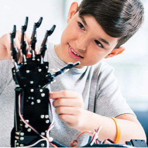 kid working on a robot