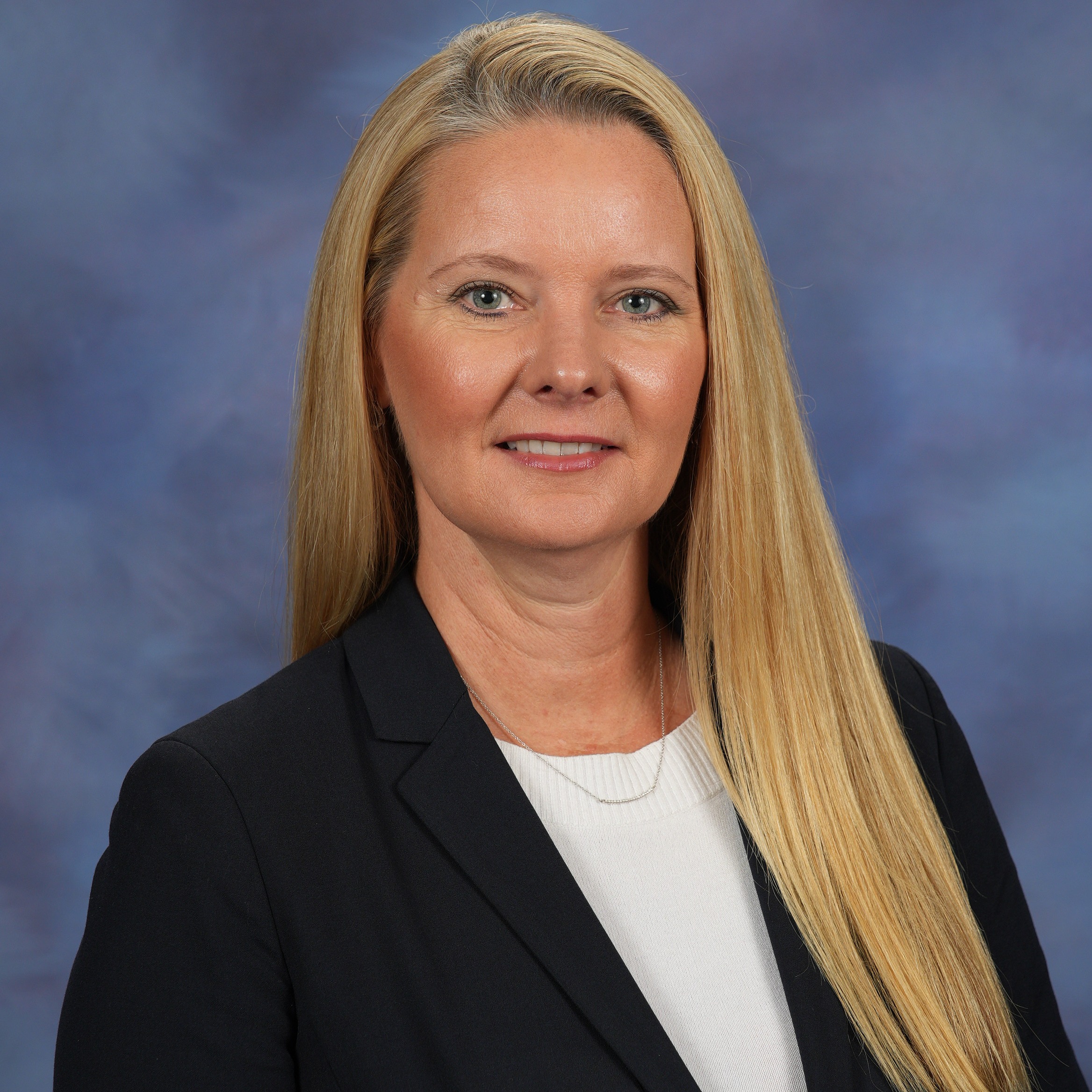 Deanna McCahan, Principal