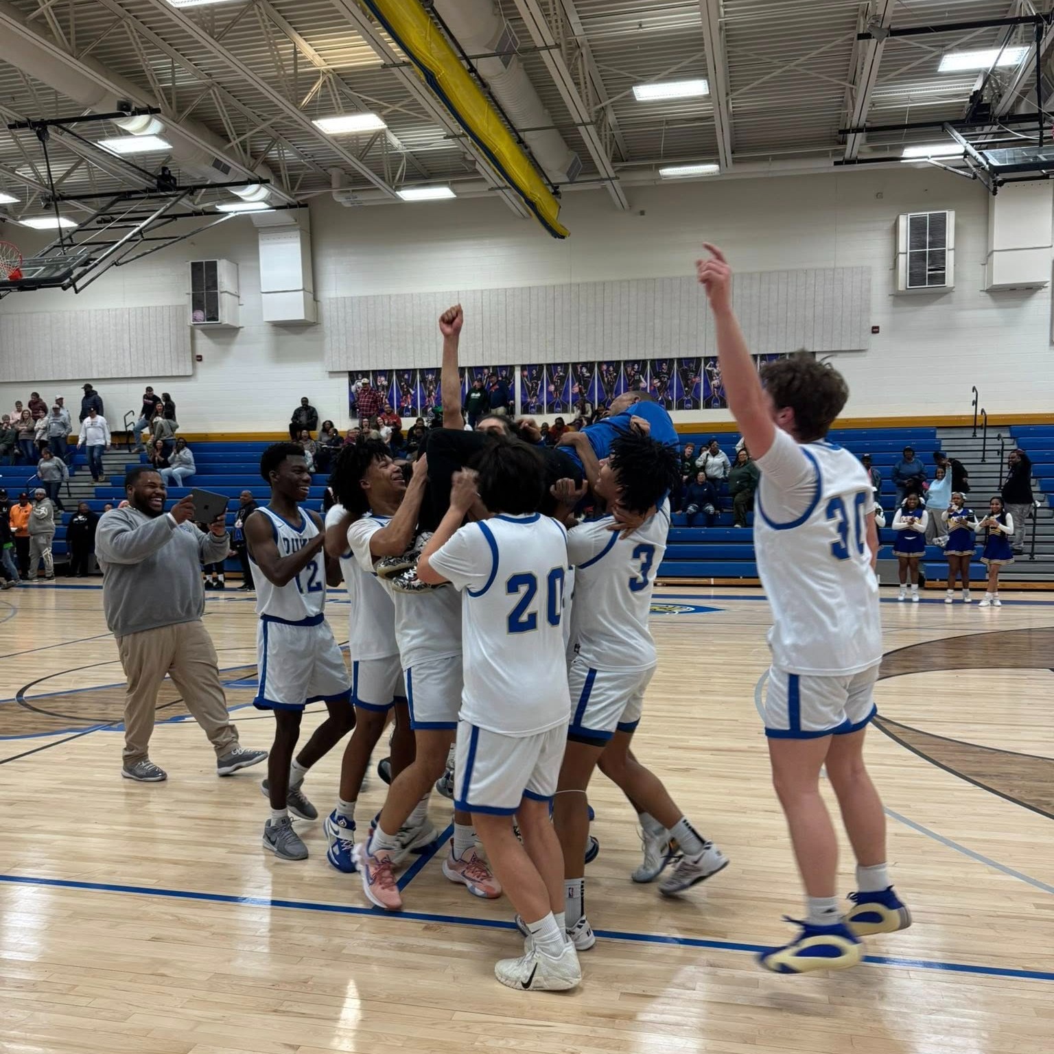 Dukes in Celebration on the Court