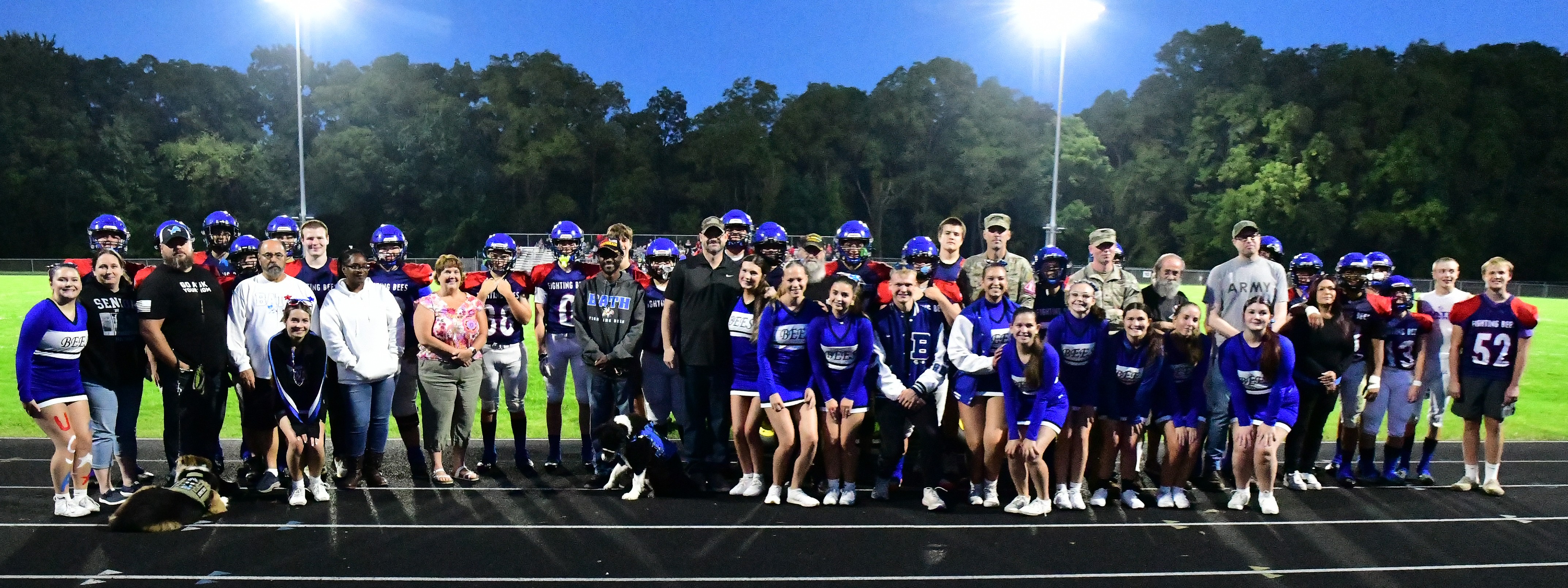 Students and Veterans at Military Night Recognition at home football game.