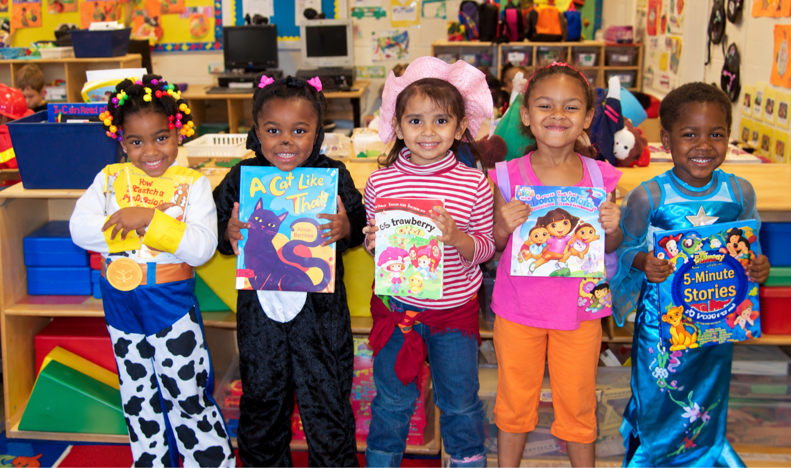 Students dressed as their favorite book character while holding the book for Character Book Parade