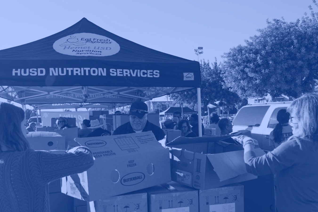 nutrition services department looking through boxes