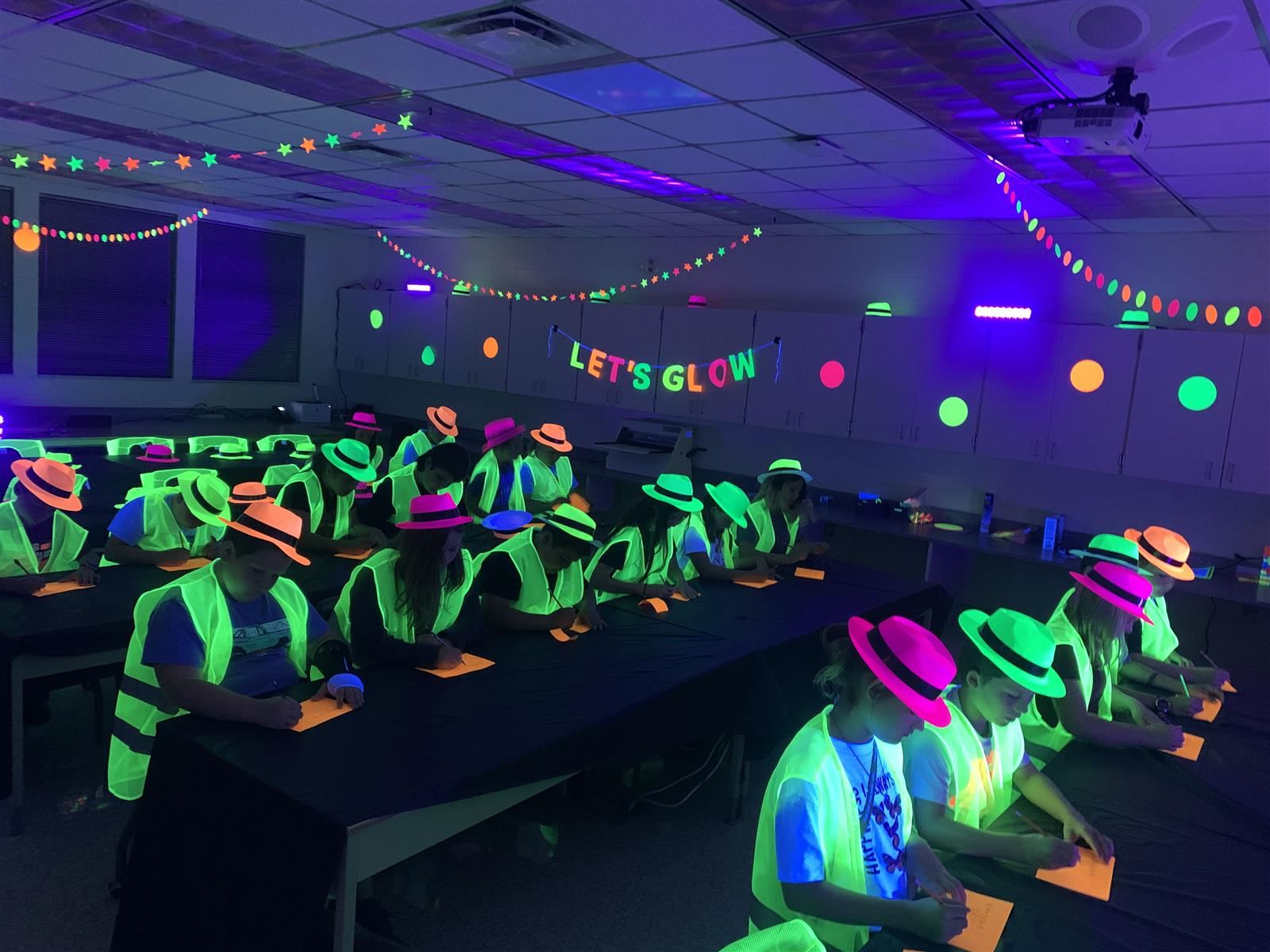 students with glow in the dark clothing