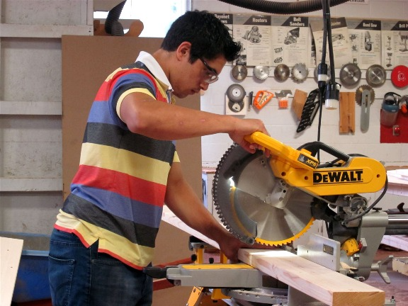 Student working in carpentry shop