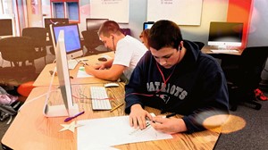 students at work in graphic design