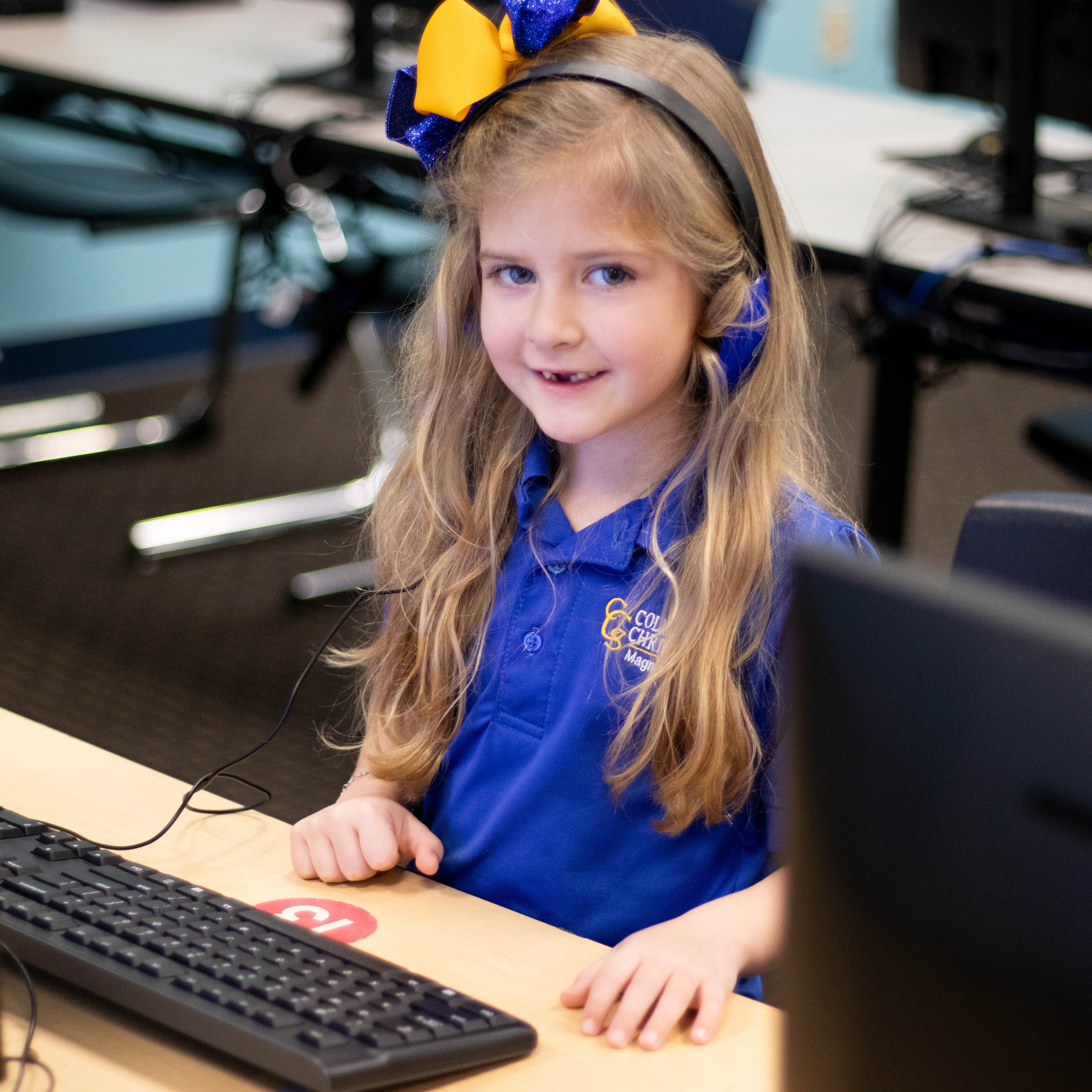 Student at computer.