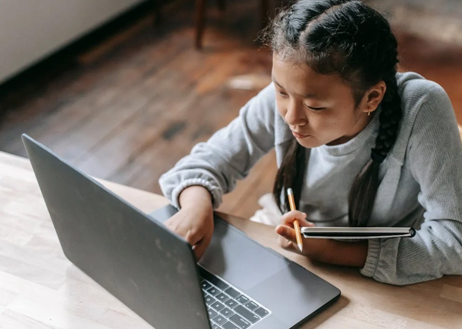 Student working on a laptop