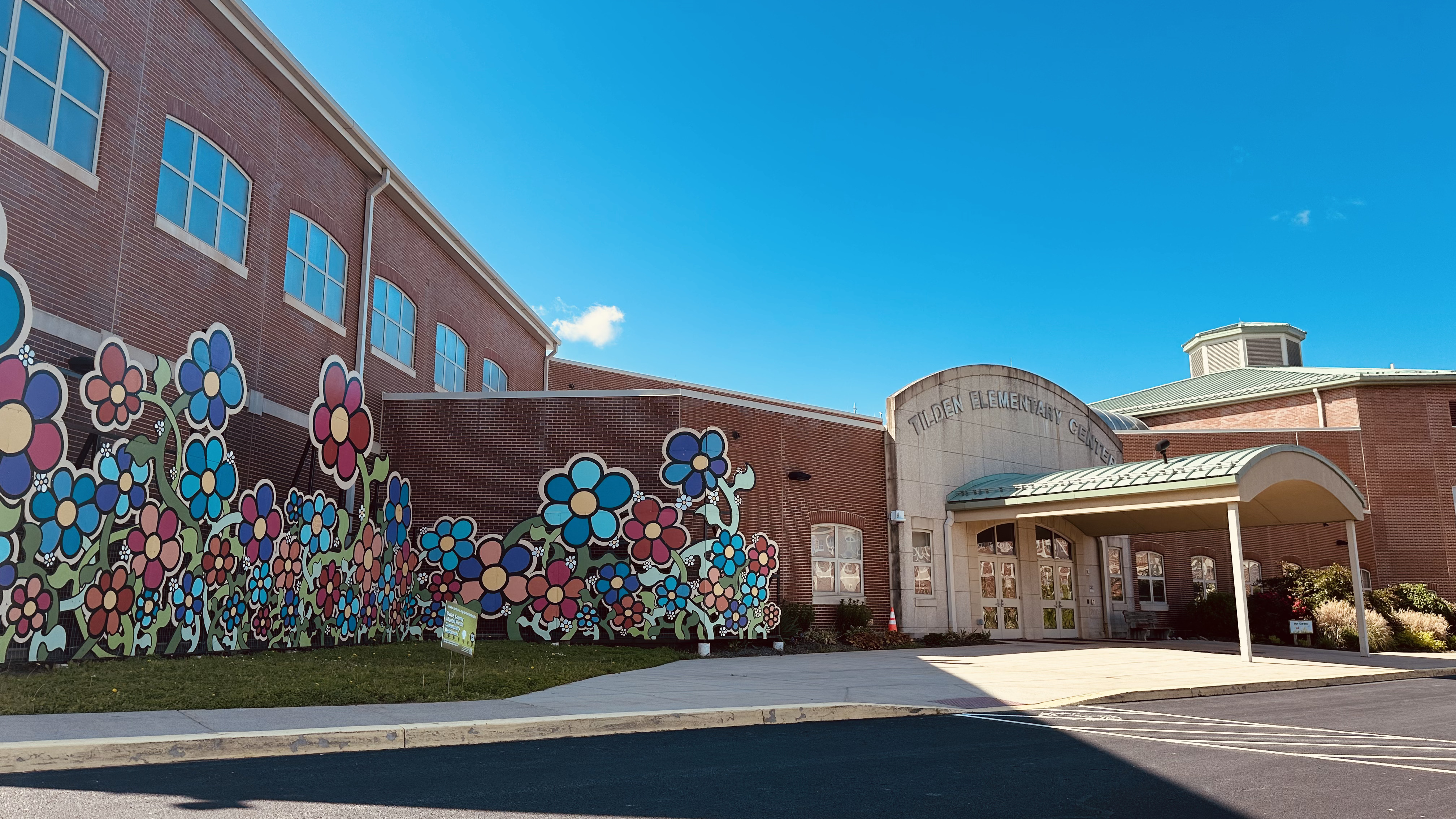 Tilden Front Entrance with Collage from 10,000 Flowers Project